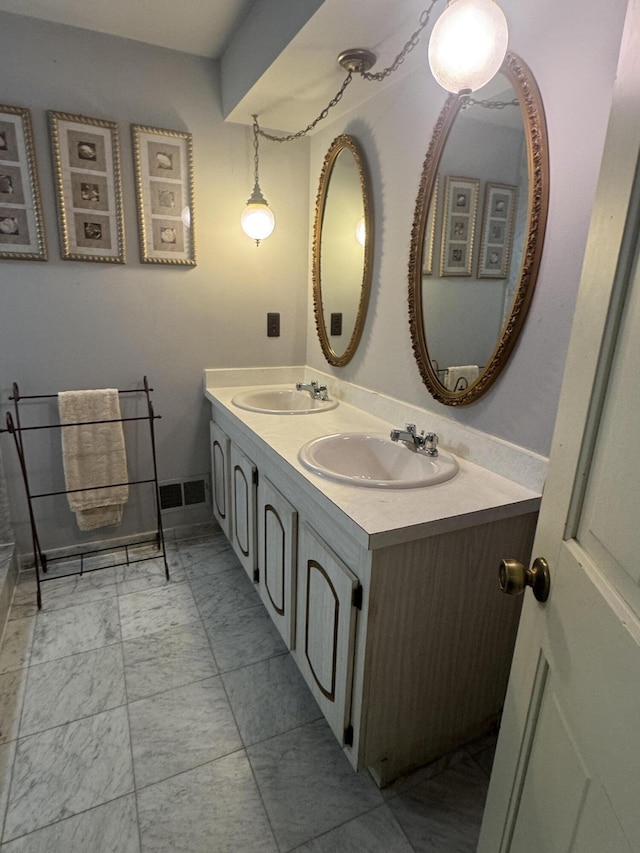 28902 Creek Bend Dr, Farmington Hills, MI 48331 - full bath with double vanity and marble finish floors