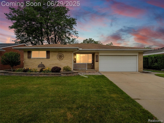 29553 Pinto Dr, Warren, MI 48093 - ranch-style home featuring a garage, brick siding, driveway, and a front lawn