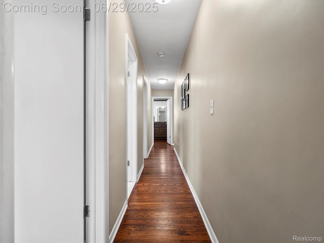 29553 Pinto Dr, Warren, MI 48093 - hallway with dark wood-type flooring and baseboards
