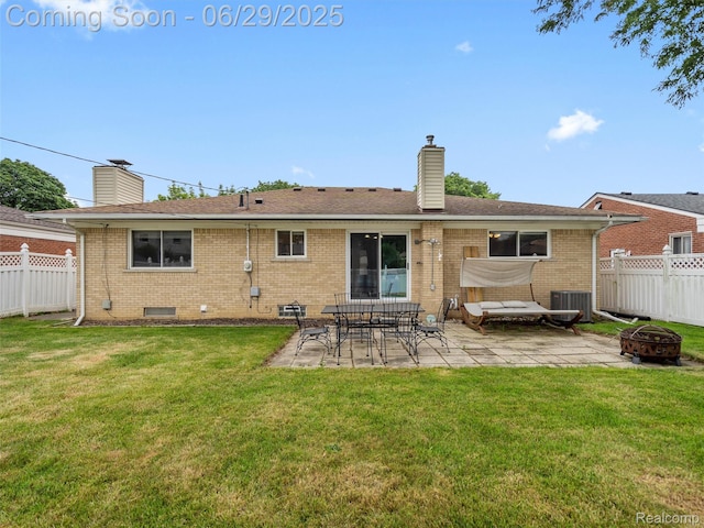 29553 Pinto Dr, Warren, MI 48093 - rear view of property with an outdoor fire pit, a patio, a chimney, brick siding, and crawl space