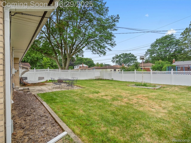 29553 Pinto Dr, Warren, MI 48093 - fenced backyard with a patio and a garden