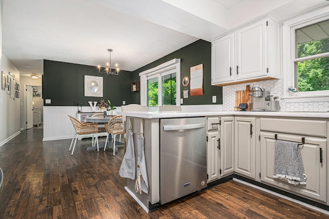 3042 Kevin St, Saint Joseph, MI 49085 - kitchen featuring dishwasher, plenty of natural light, light countertops, and dark wood-style flooring