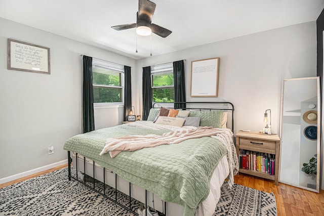 3042 Kevin St, Saint Joseph, MI 49085 - bedroom featuring wood finished floors and a ceiling fan