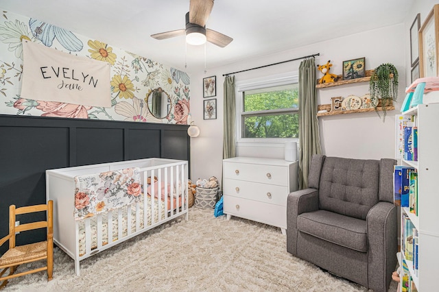 3042 Kevin St, Saint Joseph, MI 49085 - bedroom featuring carpet floors, a crib, and ceiling fan