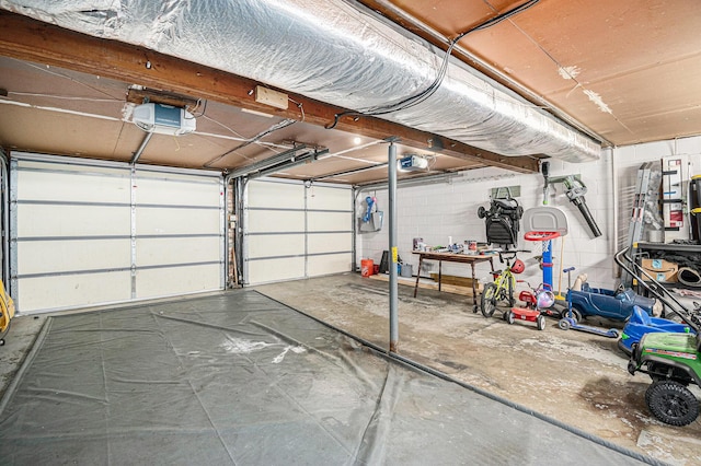3042 Kevin St, Saint Joseph, MI 49085 - garage featuring a garage door opener