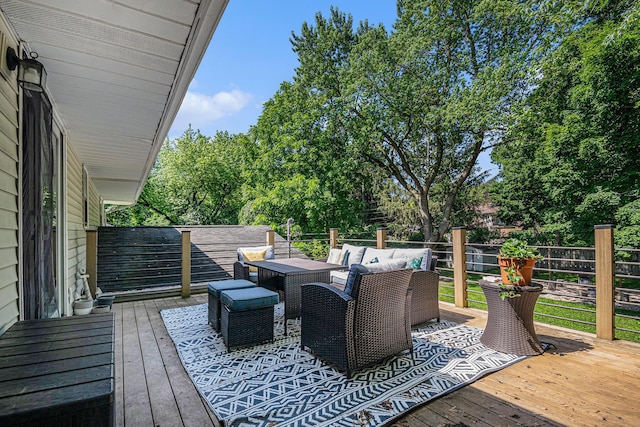 3042 Kevin St, Saint Joseph, MI 49085 - wooden terrace with outdoor dining space, view of wooded area, and an outdoor living space