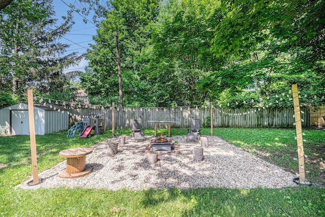 3042 Kevin St, Saint Joseph, MI 49085 - fenced backyard featuring a storage unit