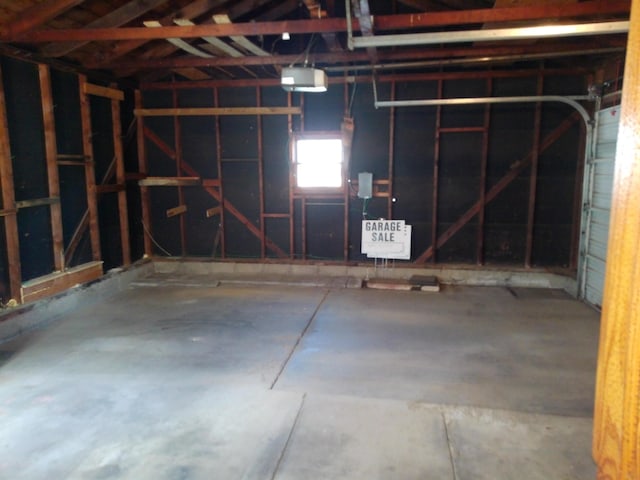 1602 Blakely Ave, Jackson, MI 49202 - garage featuring a garage door opener