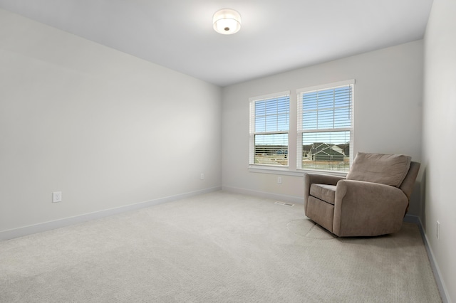 8114 Turning Stone, Kalamazoo, MI 49009 - living area with baseboards and light carpet