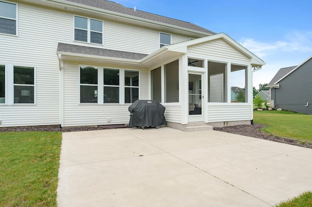 8114 Turning Stone, Kalamazoo, MI 49009 - back of house with a sunroom, a patio, a yard, and roof with shingles