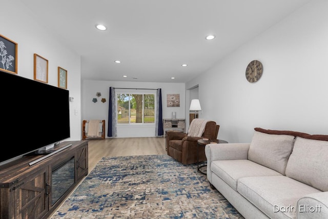 412 S Woodworth St, Corunna, MI 48817 - living area featuring wood finished floors and recessed lighting