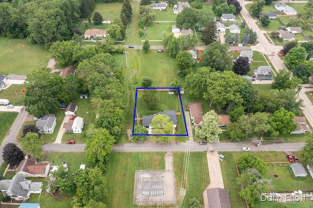 412 S Woodworth St, Corunna, MI 48817 - aerial view of residential area with property boundaries highlighted
