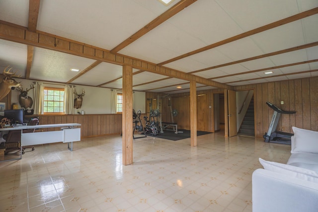 1684 W W County Line Rd, Sand Lake, MI 49343 - basement with wood walls, tile patterned floors, stairs, an office area, and a wainscoted wall