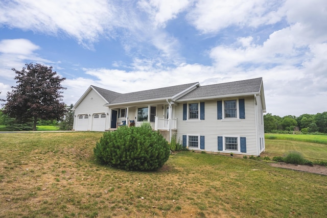 1684 W W County Line Rd, Sand Lake, MI 49343 - single story home featuring an attached garage, a front lawn, covered porch, and roof with shingles