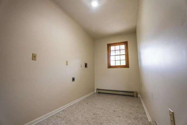 1684 W W County Line Rd, Sand Lake, MI 49343 - spare room with a baseboard heating unit and baseboards