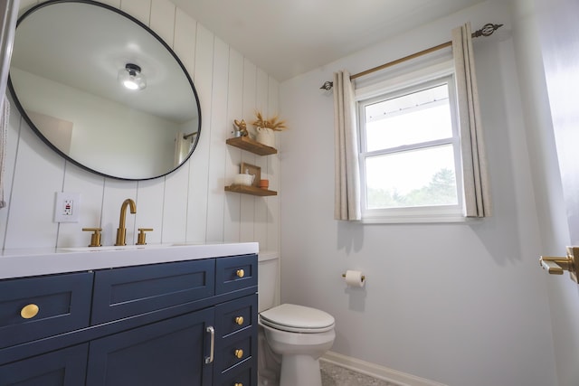 1684 W W County Line Rd, Sand Lake, MI 49343 - bathroom featuring vanity and toilet