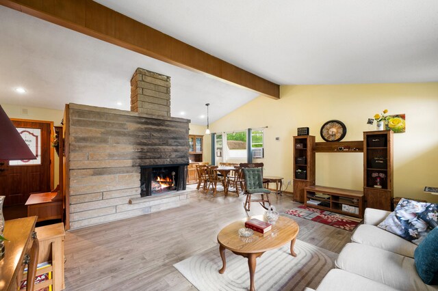 275 Benjamin St, Benton Harbor, MI 49022 - living area with wood finished floors, a multi sided fireplace, and recessed lighting