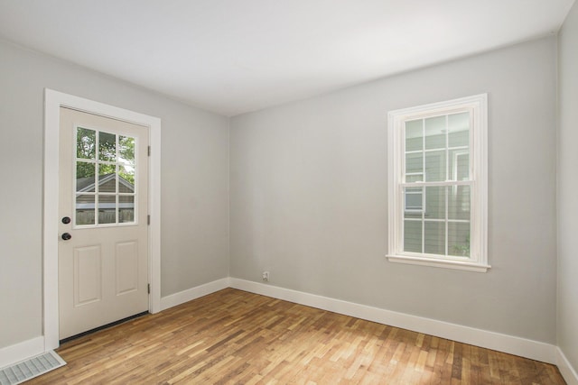 185 W 21st St, Holland, MI 49423 - unfurnished room with light wood-type flooring