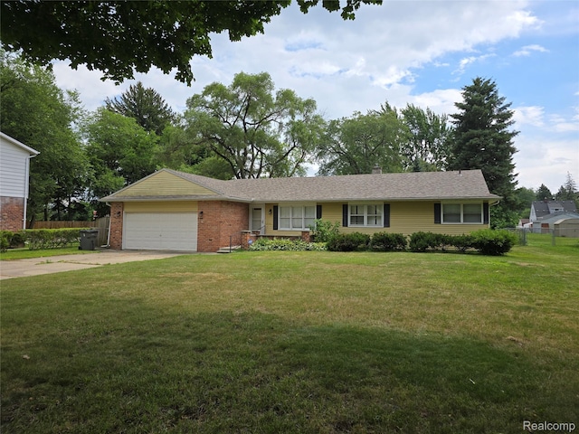 22024 Lester St, Clinton Township, MI 48035 - ranch-style home with an attached garage, driveway, brick siding, and a chimney