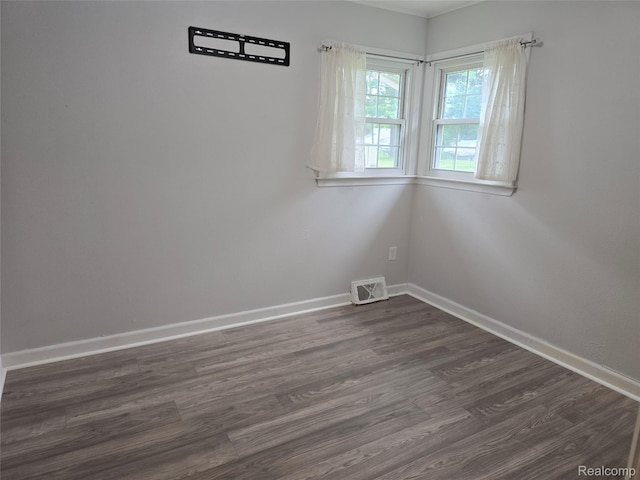 22024 Lester St, Clinton Township, MI 48035 - unfurnished room featuring dark wood-style floors