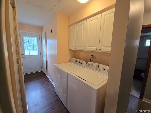 22024 Lester St, Clinton Township, MI 48035 - laundry area featuring attic access, cabinet space, dark wood-type flooring, and plenty of natural light