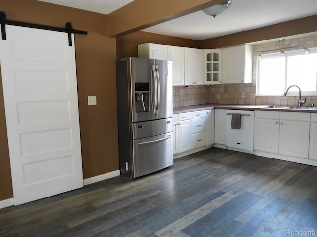 3351 Grant Rd, Rochester Hills, MI 48309 - kitchen with stainless steel fridge with ice dispenser, dishwasher, decorative backsplash, white cabinetry, and a barn door