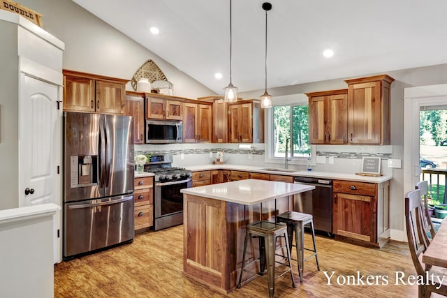 4005 Bullseye Ln, Dorr, MI 49323 - kitchen with appliances with stainless steel finishes, backsplash, light wood-style floors, light countertops, and recessed lighting
