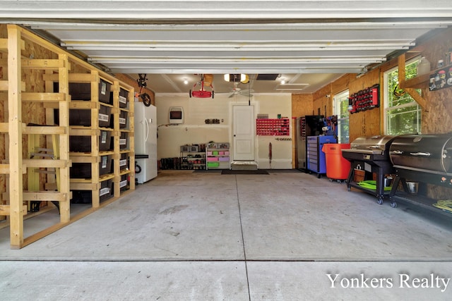 4005 Bullseye Ln, Dorr, MI 49323 - garage with a garage door opener