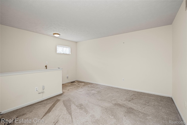 480 Hosta, Howell, MI 48843 - unfurnished room with carpet floors and a textured ceiling
