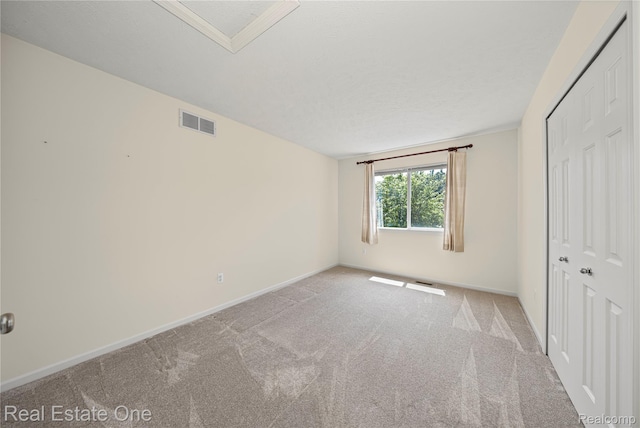 480 Hosta, Howell, MI 48843 - unfurnished bedroom featuring carpet floors and baseboards