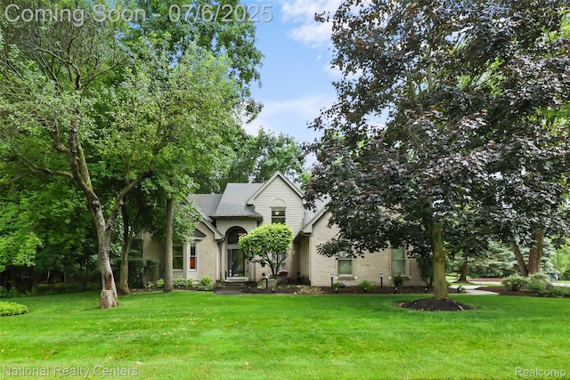 7319 Autumn Hill Dr, West Bloomfield, MI 48323 - view of front of property with a front lawn