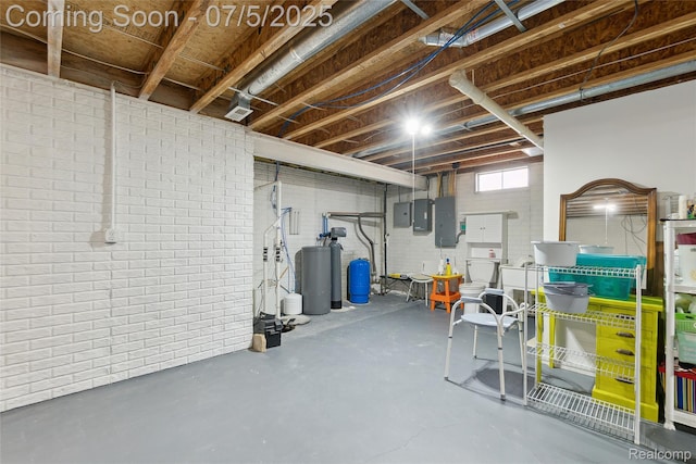 2187 Anoka St, Flint, MI 48532 - basement featuring a water softener, electric panel, and a water pressure tank