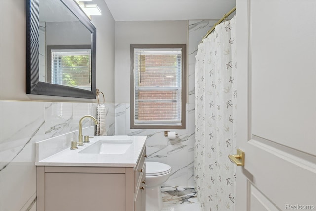 9585 Asbury Park, Detroit, MI 48227 - full bath featuring tile walls, vanity, marble finish floors, curtained shower, and wainscoting