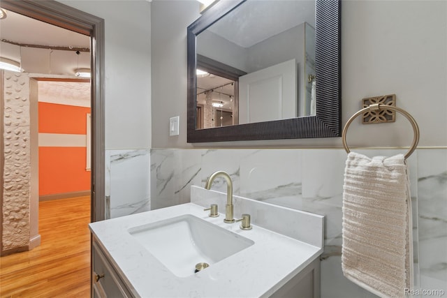 9585 Asbury Park, Detroit, MI 48227 - bathroom featuring vanity, wood finished floors, and wainscoting