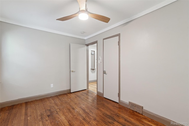 9585 Asbury Park, Detroit, MI 48227 - unfurnished room featuring wood finished floors, a ceiling fan, and ornamental molding