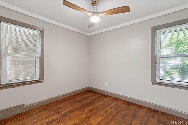9585 Asbury Park, Detroit, MI 48227 - spare room with wood finished floors and a ceiling fan