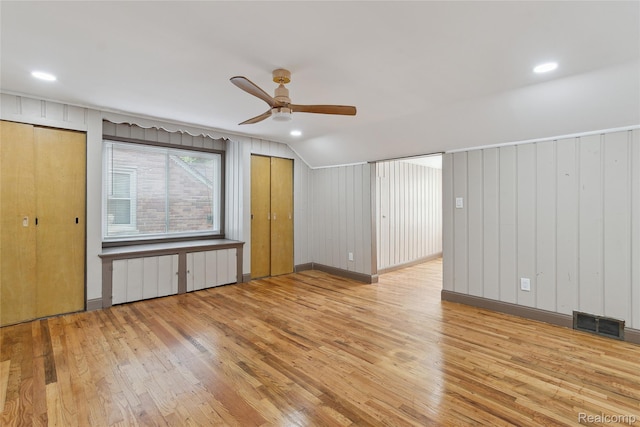 9585 Asbury Park, Detroit, MI 48227 - unfurnished bedroom with wood finished floors, two closets, vaulted ceiling, recessed lighting, and ceiling fan