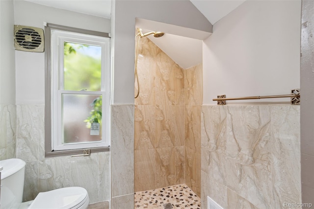 9585 Asbury Park, Detroit, MI 48227 - full bathroom featuring tile walls, a tile shower, vaulted ceiling, and wainscoting