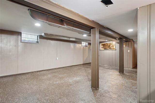 9585 Asbury Park, Detroit, MI 48227 - below grade area with wood walls and tile patterned floors