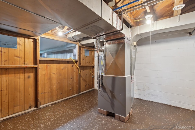 9585 Asbury Park, Detroit, MI 48227 - unfinished basement with heating unit, concrete block wall, and wooden walls