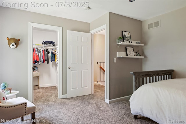 7155 Campbell Mills Ct, Brighton, MI 48116 - carpeted bedroom with a walk in closet and a closet