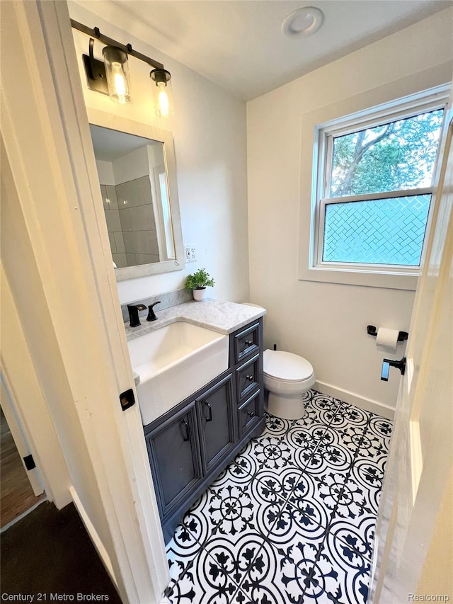 2122 Pierce St, Flint, MI 48503 - bathroom with vanity and toilet