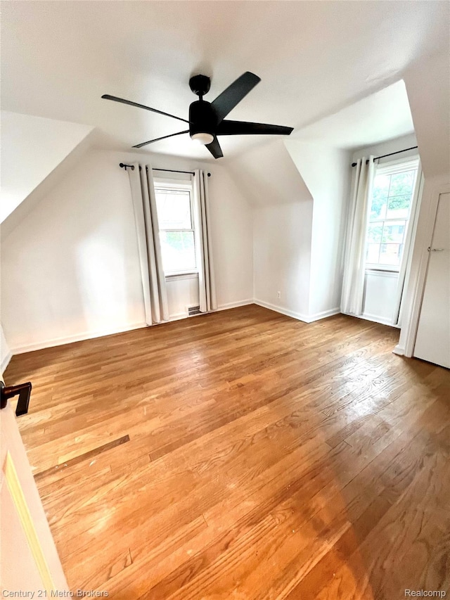 2122 Pierce St, Flint, MI 48503 - bonus room featuring lofted ceiling, wood finished floors, and ceiling fan