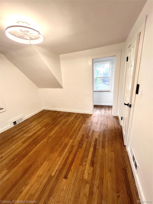 2122 Pierce St, Flint, MI 48503 - bonus room featuring hardwood / wood-style flooring and vaulted ceiling