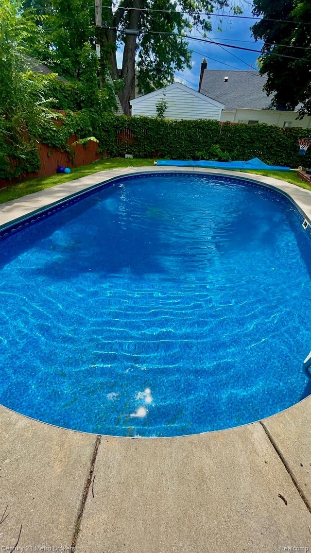 2122 Pierce St, Flint, MI 48503 - view of swimming pool with a fenced backyard