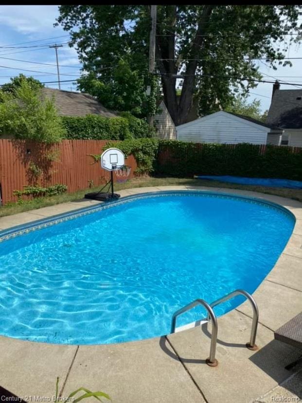 2122 Pierce St, Flint, MI 48503 - view of pool with a fenced backyard