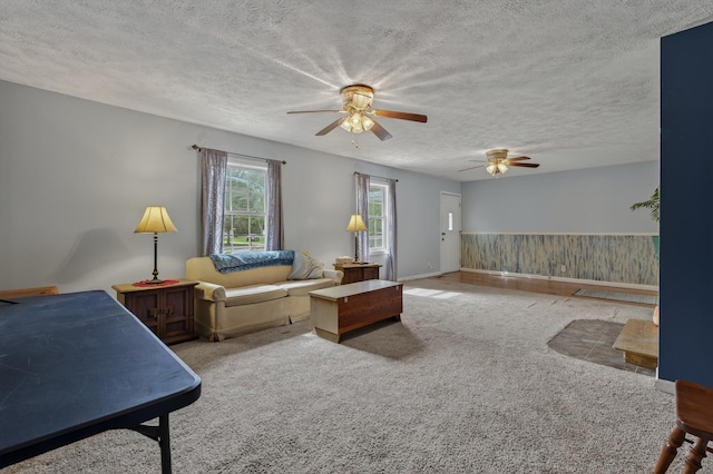 70661 Dennis Dr, Niles, MI 49120 - carpeted living room featuring a ceiling fan and a textured ceiling