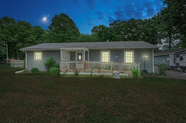 70661 Dennis Dr, Niles, MI 49120 - ranch-style home featuring a front lawn, a wooden deck, and a pergola