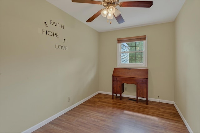 70661 Dennis Dr, Niles, MI 49120 - empty room with wood finished floors and ceiling fan
