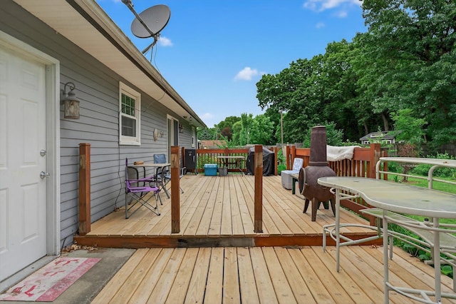 70661 Dennis Dr, Niles, MI 49120 - deck with outdoor dining space and view of scattered trees